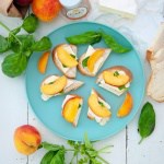 Basil Peach Brie Crostini with honey