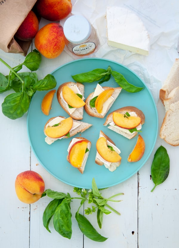 Basil Peach Brie Crostini with honey